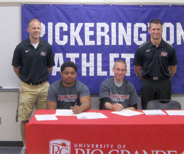 Pickerington Central's Alex Nichols (seated left) and Nathaniel Kosnich (seated right) sign to continue their careers at Rio 